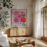 Floral Burst I by Farida Zaman. Shown in a natural wood frame in a cozy modern living room. Available as an archival giclee rolled canvas, fine art paper, or poster print. SKU 56936a.