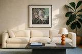 Floral Elegance Black by Farida Zaman. Displayed in a glass frame with matte in a clean modern living room. Available as an archival giclee rolled canvas, fine art paper, or poster print. SKU 57807a.