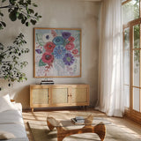 Floral Jewels II by Farida Zaman. Shown in a natural wood frame in a cozy modern living room. Available as an archival giclee rolled canvas, fine art paper, or poster print. SKU 37183a.