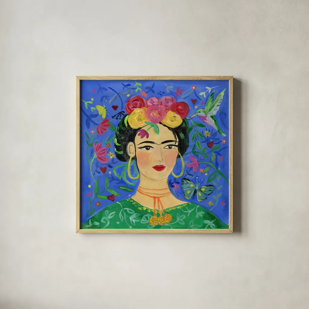 Frida Blue by Farida Zaman. Shown in a natural wood glass frame for a timeless modern aesthetic. Available as an archival giclee rolled canvas, fine art paper, or poster print. SKU 68892a.