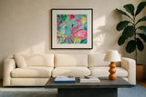 Fruity Flamingos III by Farida Zaman. Displayed in a glass frame with matte in a clean modern living room. Available as an archival giclee rolled canvas, fine art paper, or poster print. SKU 74748a.
