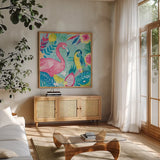 Fruity Flamingos IV by Farida Zaman. Shown in a natural wood frame in a cozy modern living room. Available as an archival giclee rolled canvas, fine art paper, or poster print. SKU 74749a.