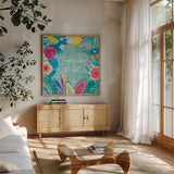 Fruity Flamingos IX by Farida Zaman. Shown in a natural wood frame in a cozy modern living room. Available as an archival giclee rolled canvas, fine art paper, or poster print. SKU 74754a.