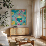 Fruity Flamingos VI by Farida Zaman. Shown in a natural wood frame in a cozy modern living room. Available as an archival giclee rolled canvas, fine art paper, or poster print. SKU 74751a.