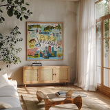 Global Travel V v2 by Farida Zaman. Shown in a natural wood frame in a cozy modern living room. Available as an archival giclee rolled canvas, fine art paper, or poster print. SKU 51502a.