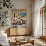 Global Travel XII v2 by Farida Zaman. Shown in a natural wood frame in a cozy modern living room. Available as an archival giclee rolled canvas, fine art paper, or poster print. SKU 51504a.
