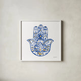 Hamsa I by Farida Zaman. Shown in a crisp white glass frame for a clean and minimalist style. Available as an archival giclee rolled canvas, fine art paper, or poster print. SKU 64352a.