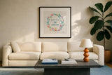 Happy Baby VII by Farida Zaman. Displayed in a glass frame with matte in a clean modern living room. Available as an archival giclee rolled canvas, fine art paper, or poster print. SKU 49100a.