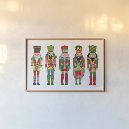Holiday Nutcrackers I by Farida Zaman. shown as a paper print in a natural frame. Available as a archival giclee rolled canvas, fine art paper, or poster print. SKU 83571i.