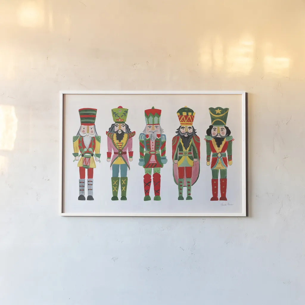 Holiday Nutcrackers I by Farida Zaman. shown as a paper print in a white frame. Available as a archival giclee rolled canvas, fine art paper, or poster print. SKU 83571i.