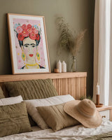 Homage to Frida v2 by Farida Zaman. shown as a paper print in a natural frame. Available as a archival giclee rolled canvas, fine art paper, or poster print. SKU 54175h.