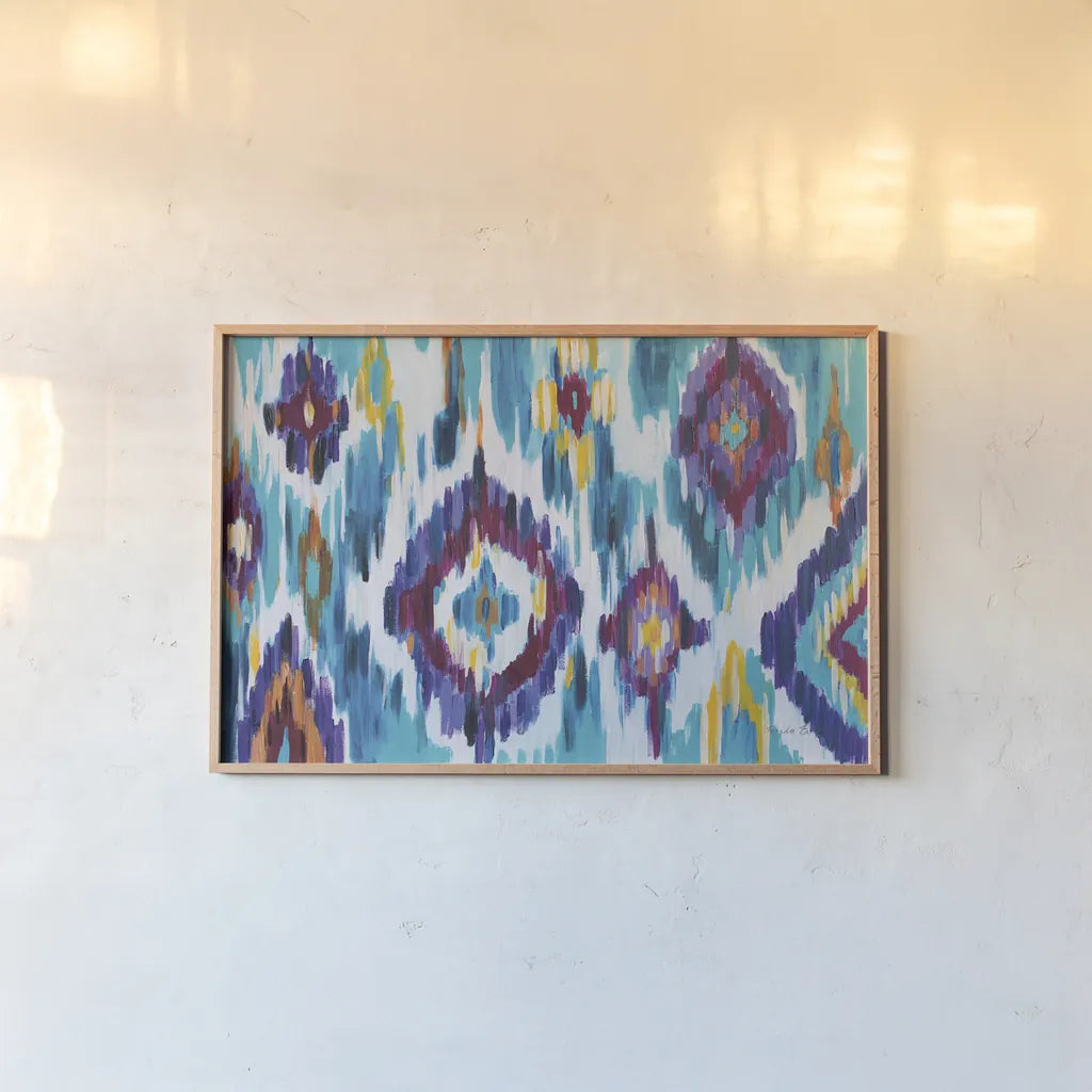 Ikat Jewel I by Farida Zaman. shown as a paper print in a natural frame. Available as a archival giclee rolled canvas, fine art paper, or poster print. SKU 45443i.