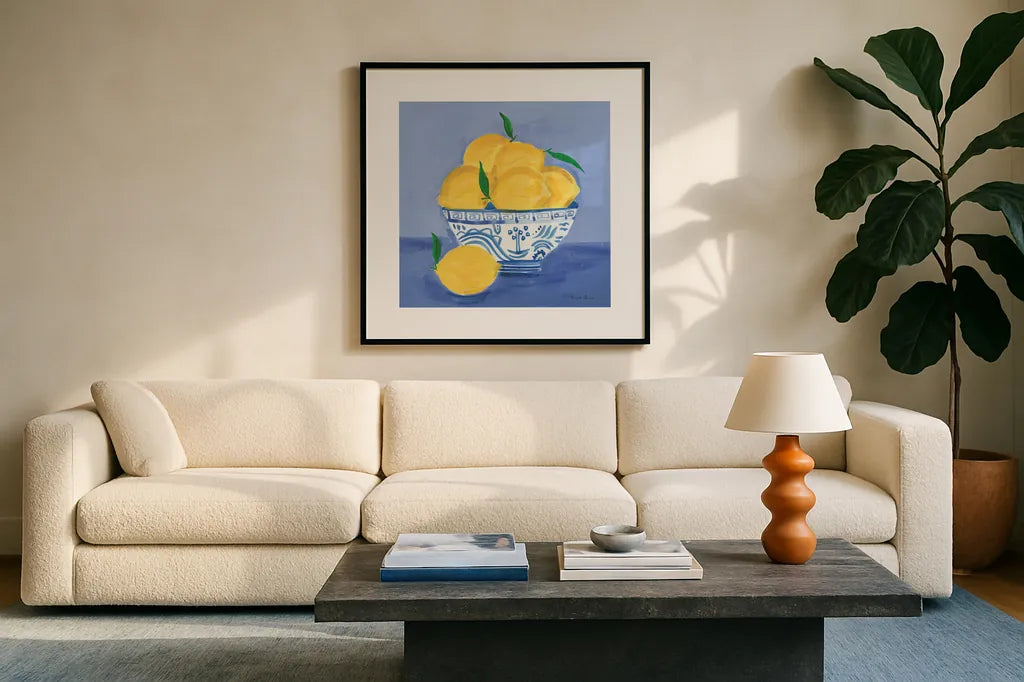 Lemon Still Life by Farida Zaman. Displayed in a glass frame with matte in a clean modern living room. Available as an archival giclee rolled canvas, fine art paper, or poster print. SKU 78768a.
