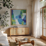 Mountain Reflection I by Farida Zaman. Shown in a natural wood frame in a cozy modern living room. Available as an archival giclee rolled canvas, fine art paper, or poster print. SKU 35416a.