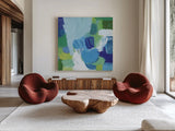Mountain Reflection I by Farida Zaman. Shown as extra-large giant wall art in a modern living room. Available as an archival giclee rolled canvas, fine art paper, or poster print. SKU 35416a.