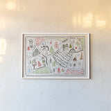 Neighborhood Holiday IV by Farida Zaman. shown as a paper print in a white frame. Available as a archival giclee rolled canvas, fine art paper, or poster print. SKU 60863i.