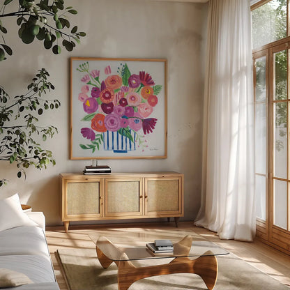 Pink Blossoms II by Farida Zaman. Shown in a natural wood frame in a cozy modern living room. Available as an archival giclee rolled canvas, fine art paper, or poster print. SKU 60943a.