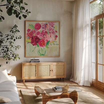 Pink and Red Florals by Farida Zaman. Shown in a natural wood frame in a cozy modern living room. Available as an archival giclee rolled canvas, fine art paper, or poster print. SKU 32160a.