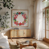 Poinsettia Wreath II by Farida Zaman. Shown in a natural wood frame in a cozy modern living room. Available as an archival giclee rolled canvas, fine art paper, or poster print. SKU 66604a.