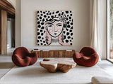 Pretty Faces I Pink by Farida Zaman. Shown as extra-large giant wall art in a modern living room. Available as an archival giclee rolled canvas, fine art paper, or poster print. SKU 67611a.