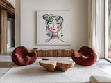 Pretty Faces II by Farida Zaman. Shown as extra-large giant wall art in a modern living room. Available as an archival giclee rolled canvas, fine art paper, or poster print. SKU 59731a.