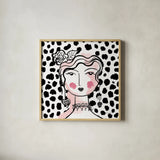 Pretty Faces II Pink by Farida Zaman. Shown in a natural wood glass frame for a timeless modern aesthetic. Available as an archival giclee rolled canvas, fine art paper, or poster print. SKU 67612a.
