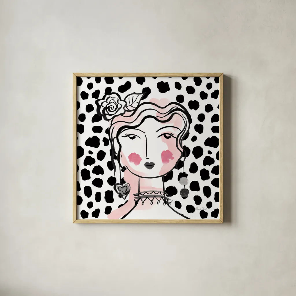 Pretty Faces II Pink by Farida Zaman. Shown in a natural wood glass frame for a timeless modern aesthetic. Available as an archival giclee rolled canvas, fine art paper, or poster print. SKU 67612a.