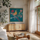 Royal Birds II Blue by Farida Zaman. Shown in a natural wood frame in a cozy modern living room. Available as an archival giclee rolled canvas, fine art paper, or poster print. SKU 68974a.