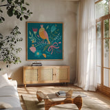 Royal Birds IV Blue by Farida Zaman. Shown in a natural wood frame in a cozy modern living room. Available as an archival giclee rolled canvas, fine art paper, or poster print. SKU 68976a.