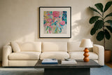 Summer Pink Floral by Farida Zaman. Displayed in a glass frame with matte in a clean modern living room. Available as an archival giclee rolled canvas, fine art paper, or poster print. SKU 39068a.