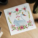 Swan Love I v2 by Farida Zaman. Shown as a detailed flat fine art print, highlighting archival giclee quality. Available as an archival giclee rolled canvas, fine art paper, or poster print. SKU 45898a.