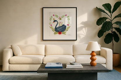 Swan Love II by Farida Zaman. Displayed in a glass frame with matte in a clean modern living room. Available as an archival giclee rolled canvas, fine art paper, or poster print. SKU 38748a.