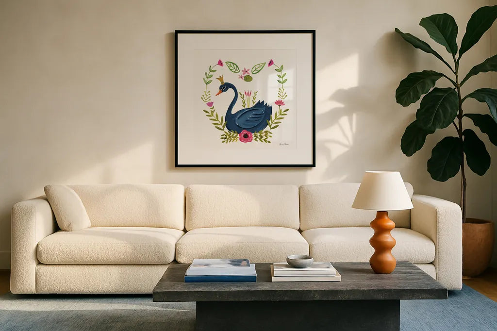 Swan Love II v2 by Farida Zaman. Displayed in a glass frame with matte in a clean modern living room. Available as an archival giclee rolled canvas, fine art paper, or poster print. SKU 45899a.