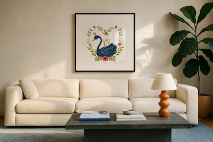 Swan Love II v2 by Farida Zaman. Displayed in a glass frame with matte in a clean modern living room. Available as an archival giclee rolled canvas, fine art paper, or poster print. SKU 45899a.