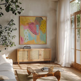 Transition I by Farida Zaman. Shown in a natural wood frame in a cozy modern living room. Available as an archival giclee rolled canvas, fine art paper, or poster print. SKU 52735a.