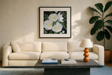 White Roses I by Farida Zaman. Displayed in a glass frame with matte in a clean modern living room. Available as an archival giclee rolled canvas, fine art paper, or poster print. SKU 104321a.