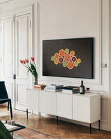 Citrus Drama I by Felicity Bradley. shown as a framed stretched canvas in a living room above a console. Available as a archival giclee rolled canvas, fine art paper, or poster print. SKU 45712i.