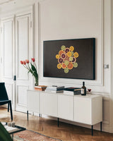 Citrus Drama II by Felicity Bradley. shown as a framed stretched canvas in a living room above a console. Available as a archival giclee rolled canvas, fine art paper, or poster print. SKU 45713i.