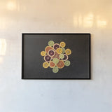 Citrus Drama II by Felicity Bradley. shown as a paper print in a black flame. Available as a archival giclee rolled canvas, fine art paper, or poster print. SKU 45713i.