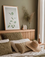 Simple Stems I by Felicity Bradley. shown as a paper print in a natural frame. Available as a archival giclee rolled canvas, fine art paper, or poster print. SKU 48469h.