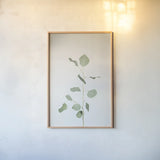 Simple Stems I by Felicity Bradley. shown as a paper print in a natural frame. Available as a archival giclee rolled canvas, fine art paper, or poster print. SKU 48469h.