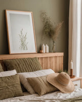 Simple Stems V by Felicity Bradley. shown as a paper print in a natural frame. Available as a archival giclee rolled canvas, fine art paper, or poster print. SKU 48473h.