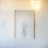 Simple Stems V by Felicity Bradley. shown as a paper print in a white frame. Available as a archival giclee rolled canvas, fine art paper, or poster print. SKU 48473h.