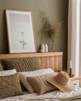 Simple Stems VI by Felicity Bradley. shown as a paper print in a natural frame. Available as a archival giclee rolled canvas, fine art paper, or poster print. SKU 48474h.