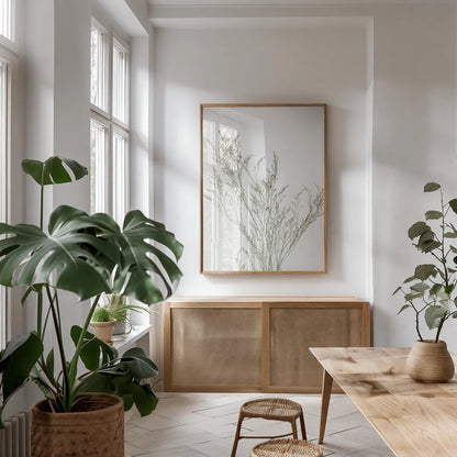 Simple Stems VII Light Crop by Felicity Bradley. shown as a print in a natural wood frame in a dining room. Available as a archival giclee rolled canvas, fine art paper, or poster print. SKU 56821h.