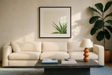 Succulent Simplicity II Neutral by Felicity Bradley. Displayed in a glass frame with matte in a clean modern living room. Available as an archival giclee rolled canvas, fine art paper, or poster print. SKU 41649a.