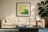 Succulent Simplicity IV by Felicity Bradley. Displayed in a glass frame with matte in a clean modern living room. Available as an archival giclee rolled canvas, fine art paper, or poster print. SKU 33837a.