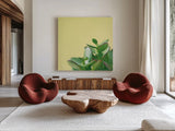Succulent Simplicity IV by Felicity Bradley. Shown as extra-large giant wall art in a modern living room. Available as an archival giclee rolled canvas, fine art paper, or poster print. SKU 33837a.