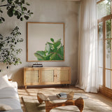 Succulent Simplicity IV Neutral by Felicity Bradley. Shown in a natural wood frame in a cozy modern living room. Available as an archival giclee rolled canvas, fine art paper, or poster print. SKU 41651a.