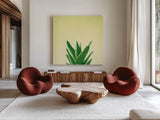 Succulent Simplicity V by Felicity Bradley. Shown as extra-large giant wall art in a modern living room. Available as an archival giclee rolled canvas, fine art paper, or poster print. SKU 33838a.